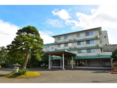 大鰐溫泉長者住宿怎麼選？少行樓梯、接駁、車椅子與房內泡湯 2026攻略